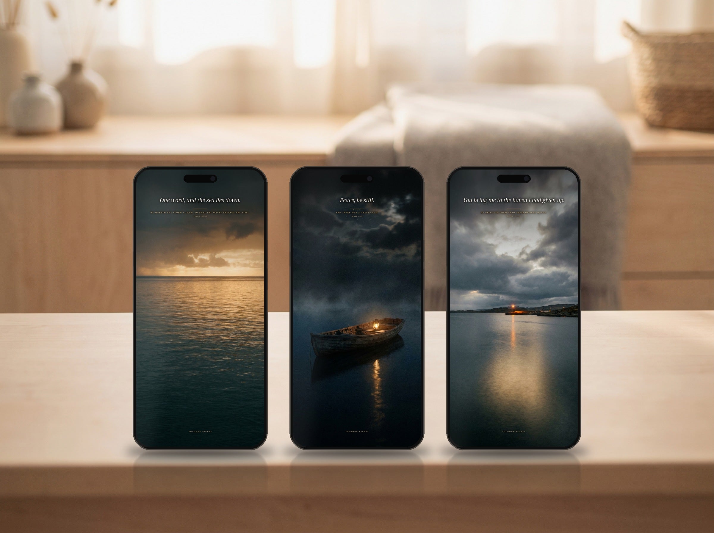 All three phone wallpapers from this set shown on three phones